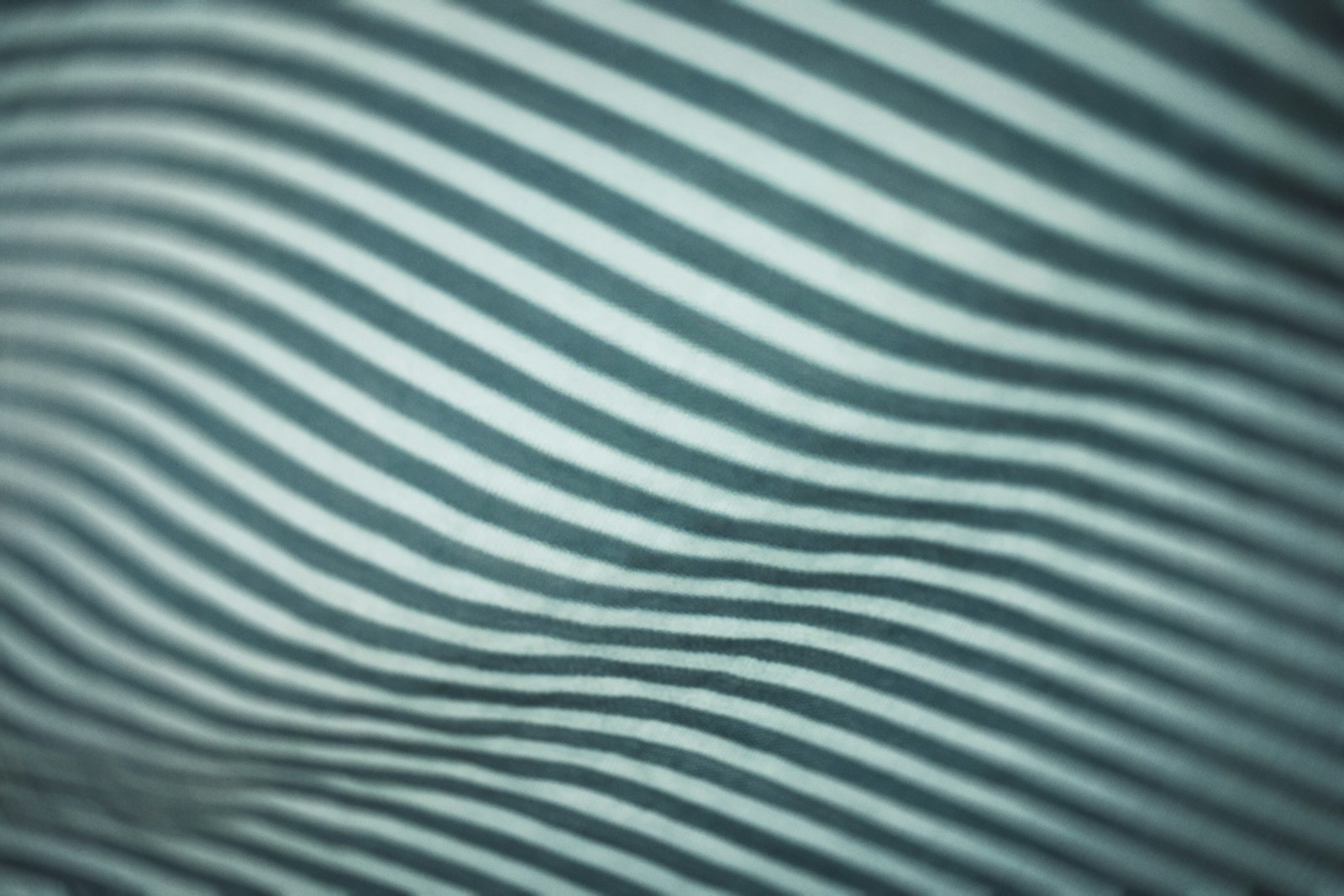 white and blue striped textile